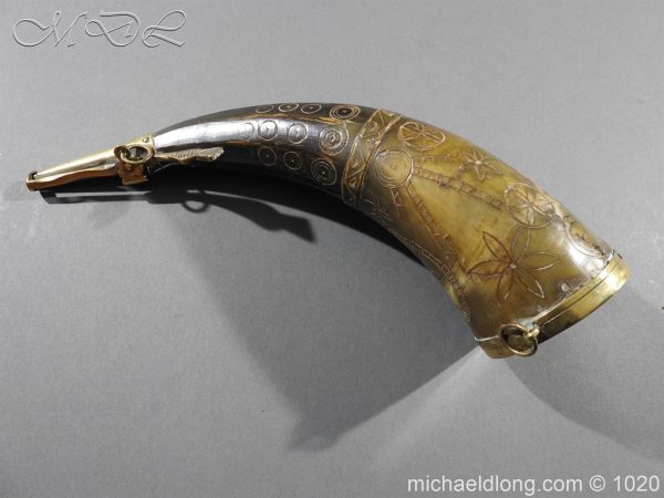 Scottish Powder Horn 18th Century the horn body curved with dots in circles and floral decoration. Brass mounted and the cap which is spring mounted is in the form of a thistle complete with 2 hanging rings