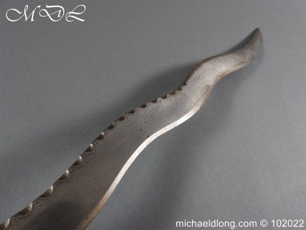 michaeldlong.com 3003266 600x450 Indian 19th Century Tulwar Hilted Serrated Sword
