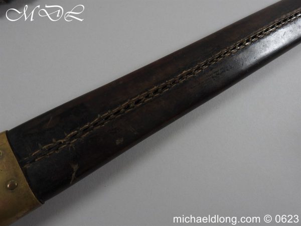 michaeldlong.com 3008257 600x450 Swiss Brass Hilted Short Sword with Saw Back Blade