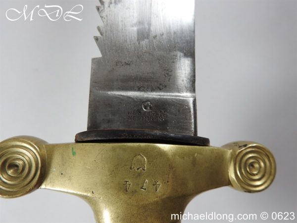 michaeldlong.com 3008260 600x450 Swiss Brass Hilted Short Sword with Saw Back Blade