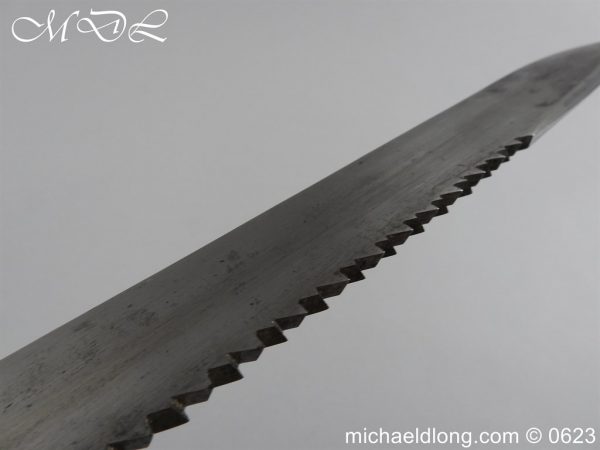 michaeldlong.com 3008265 600x450 Swiss Brass Hilted Short Sword with Saw Back Blade