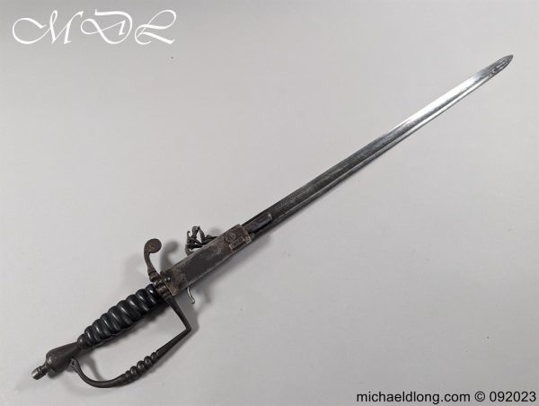 michaeldlong.com 0823310 600x452 English 19th c Flintlock Sword Pistol